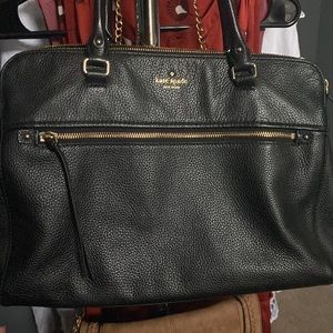 Black Kate Spade bag with striped interior